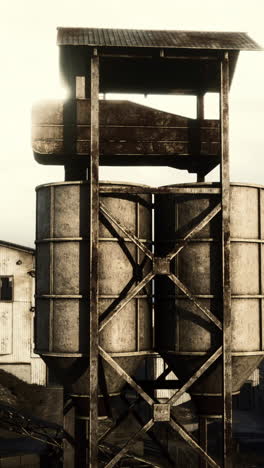 a rusty industrial silo tower