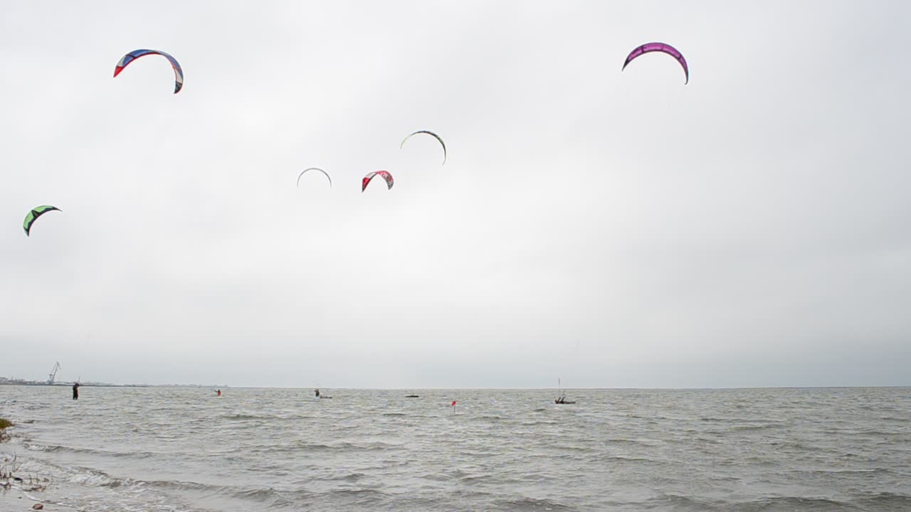 Driving on a board under a sail. Shooting at the sea