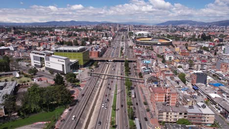 bogota, colombia. drone shot of buzzing traffic on nqs avenue in el campin neighborhood