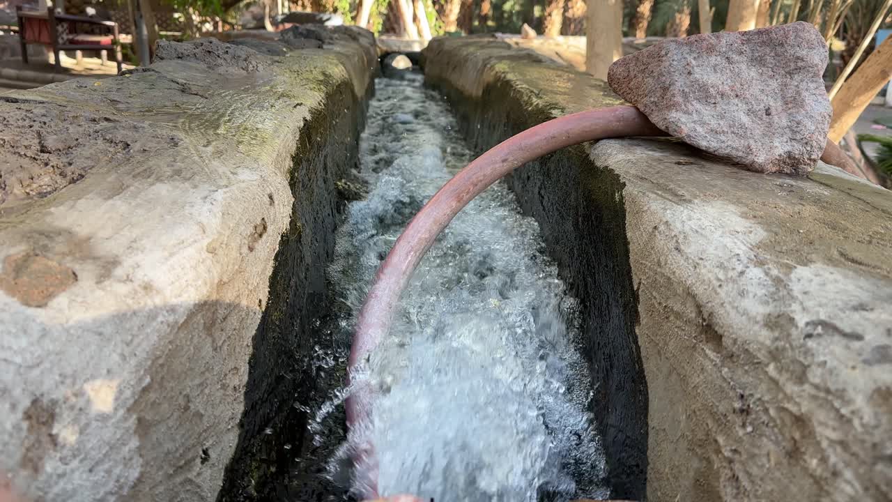 The flowing water of the well where the blessed saliva of the Prophet Muhammad was mixed