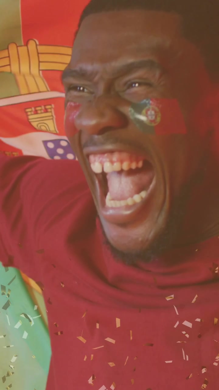 Animation of confetti falling over african american footballer celebrating with flag of portugal