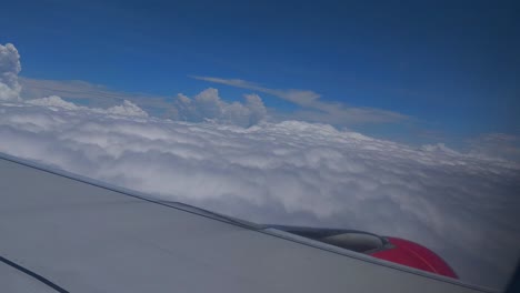 the fluffy and beautiful clouds visible from a flight above leh indian city