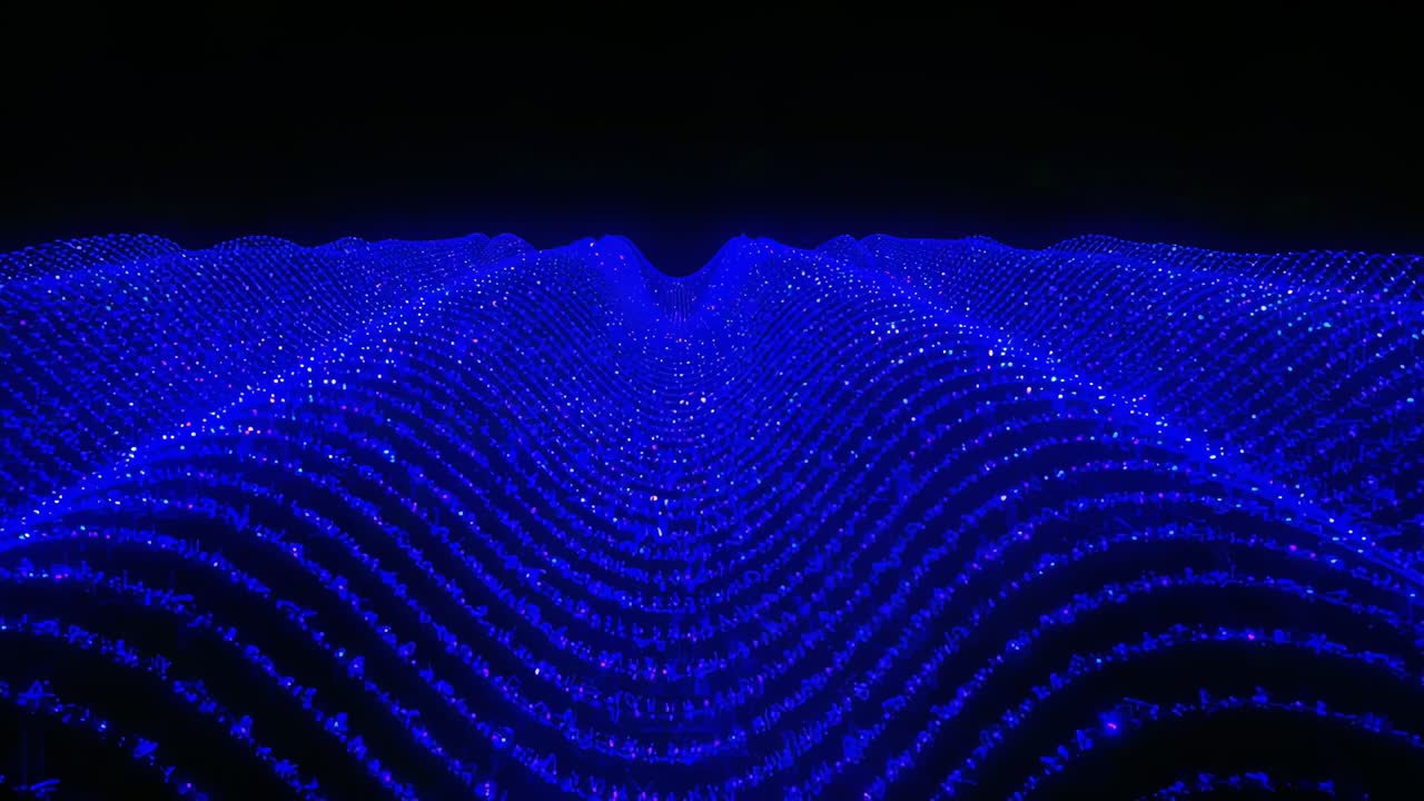 Glowing 3D-grid shifting blue to white in void ridge brightening sending pulse out forming valley