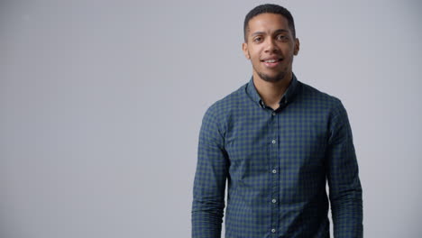 slow motion sequence of casually dressed man in studio