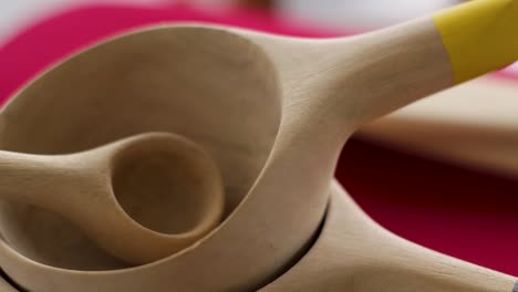 isolated wooden kitchen utensils on a platform