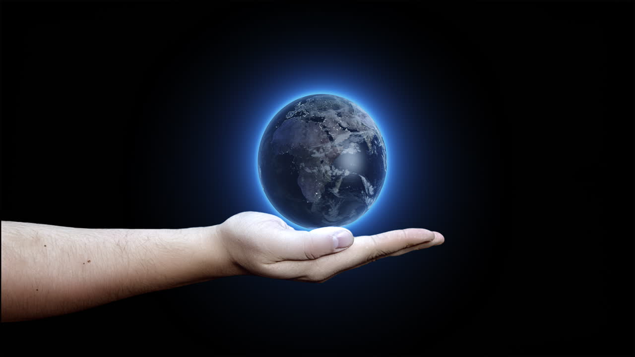 la mano del hombre sostiene el planeta tierra giratorio