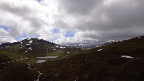 aerial of a mountain pass in norway