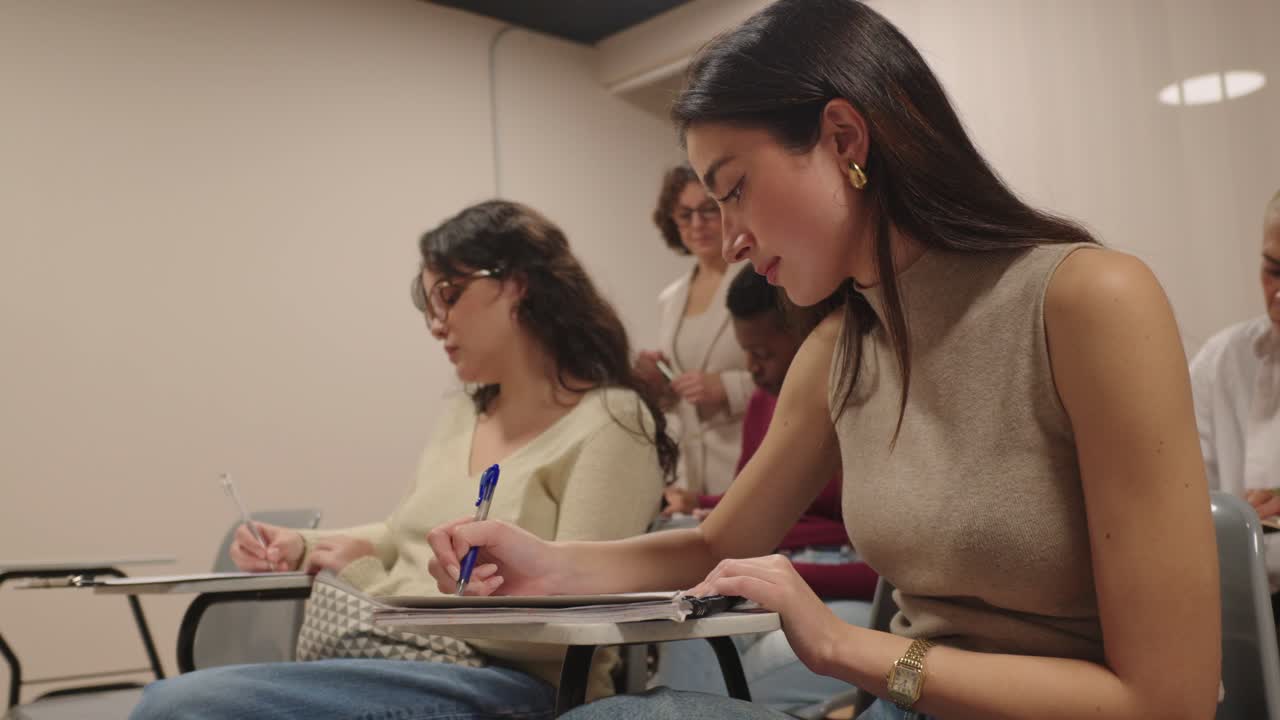 Students in a Classroom Taking Notes