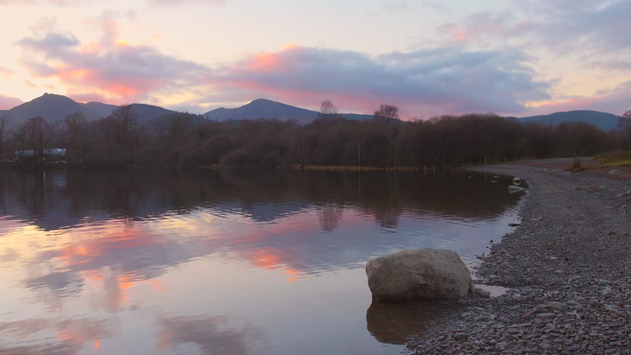 Colorful Sky Reflecting In The Waters Derwentwater At Sunset In Keswick, Lake District, Cumbria, England