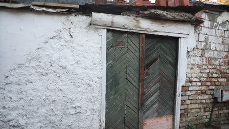 old weathered door of an abandoned building in europe