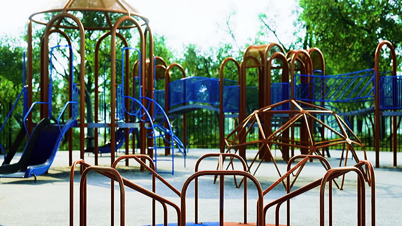 Colorful playground with slides and climbing structures under bright skies