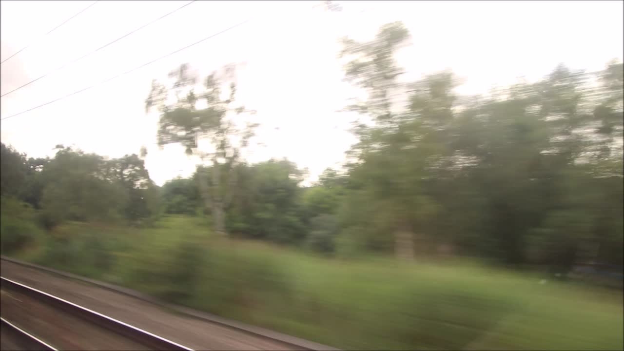 A passenger view of a mainline train journey in England, United Kingdom, from Retford to King's Cross Station