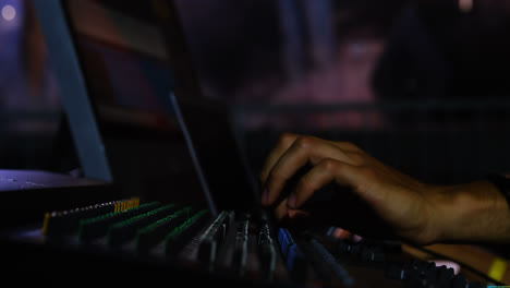 dj man using sound mixer console at a concert 4k