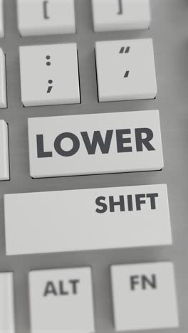 presión del botón inferior en el teclado vídeo vertical
