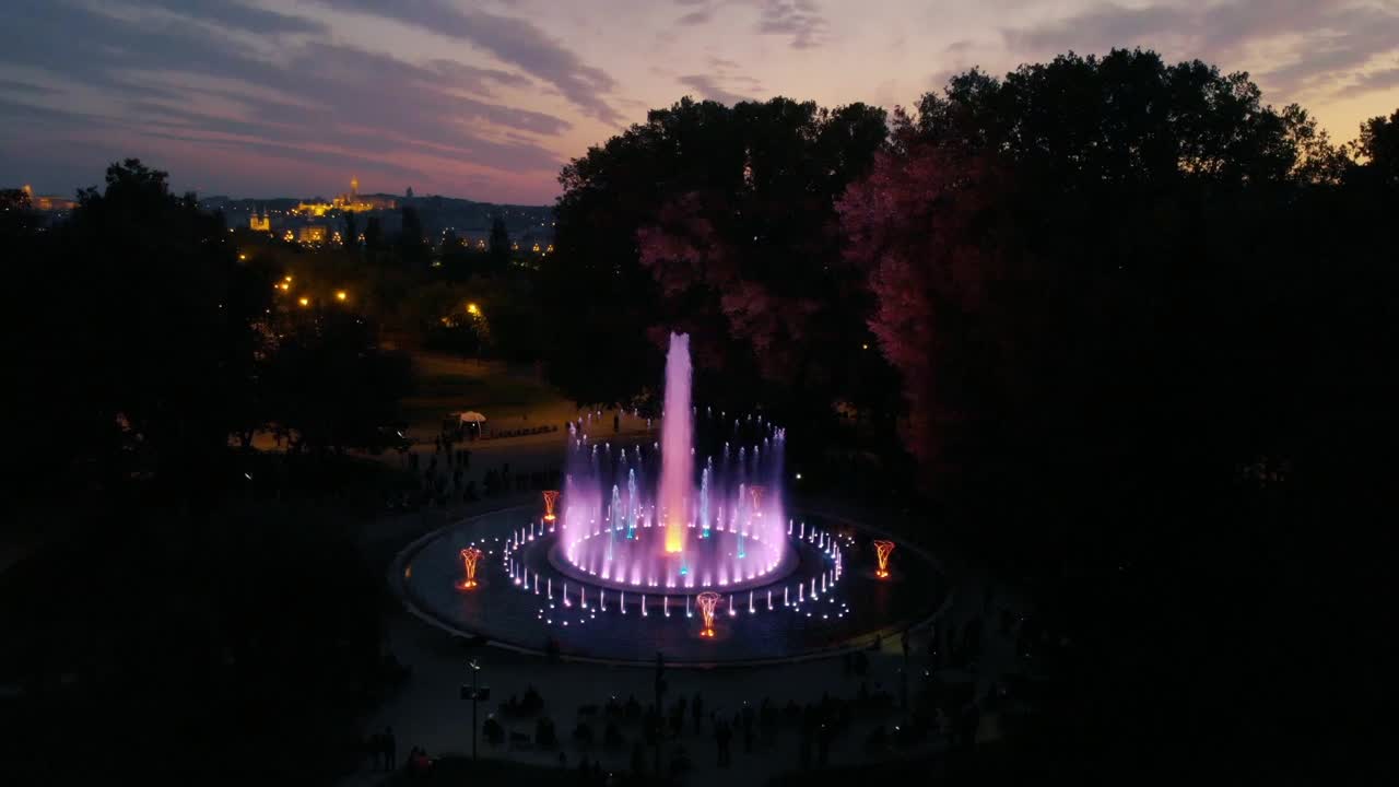 Aerial evening drone shot of the amazing and magical music fountain in Margaret Island