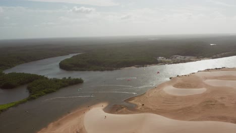 aerial: kitesurfing in the river delta of parnaiba, northern brazil