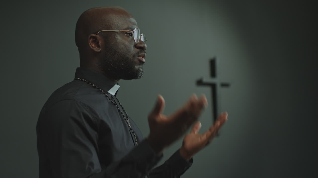 African American Priest Preaching a Sermon in Church