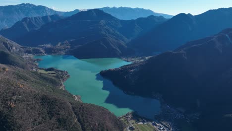 aerial panning right drone shot of ledro lake from monte cocca - not graded