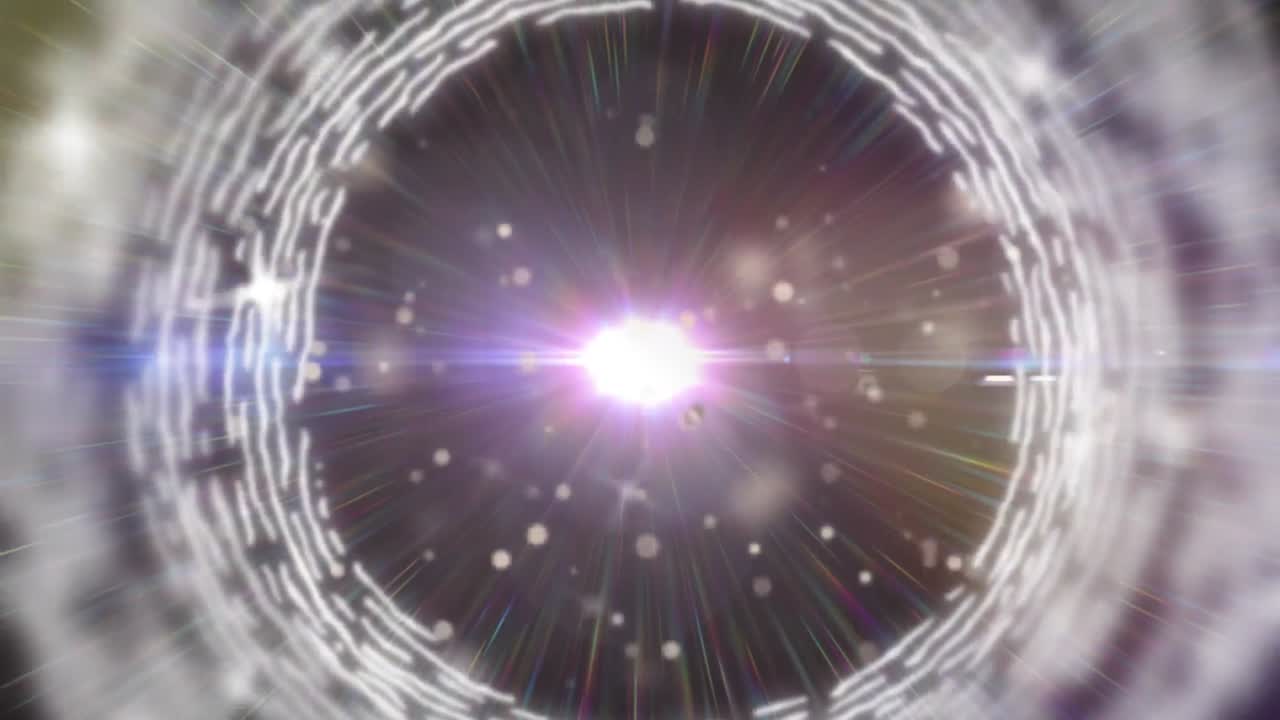 anillo blanco de luces contra un punto de luz brillante