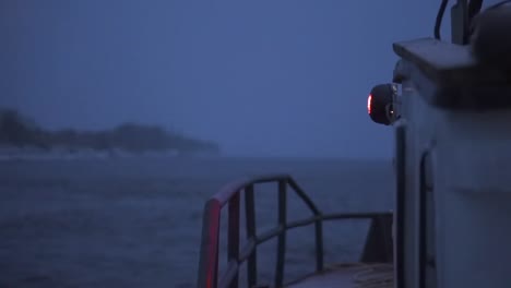 boat at night in rough seas