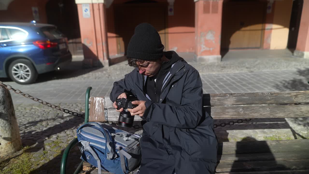 Young Photographer Taking Photos in a City Park