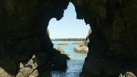 cliffside wonder: close-up of a captivating hole in the rock in mesmerizing stock footage