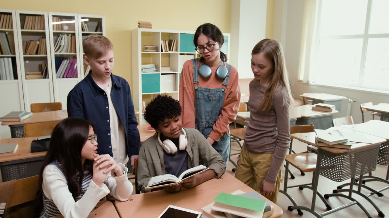 Group of students studying and collaborating in a classroom