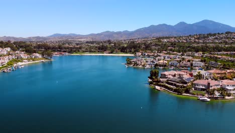 aerial fly down the middle of community lake mission viejo