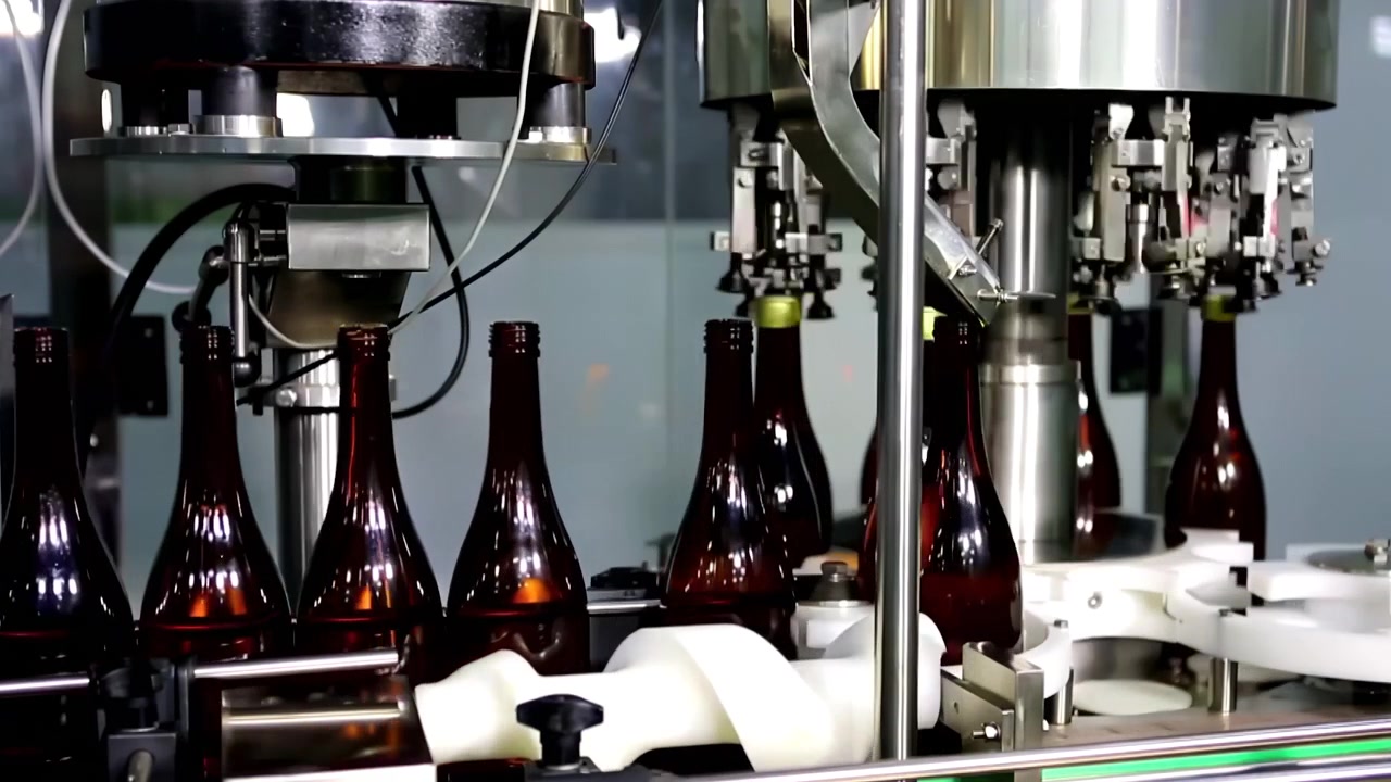 Mechanized production line of Industrial technological craft beer bottled automated conveyor for bottling process in a wine factory