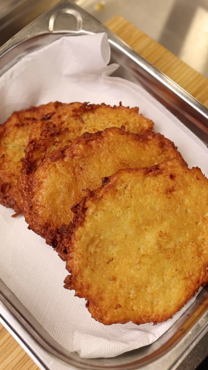Freshly Fried Golden Potato Pancakes in a Metal Tray