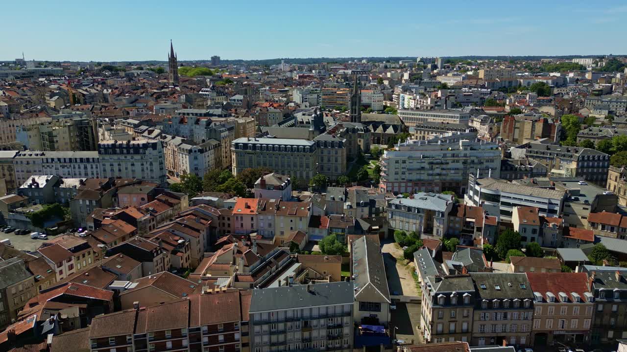 Panoramic view of Limoges cityscape, historic churches of Saint-Pierre-du-Queyroix and Saint-Michel-des-Lions, France. Aerial forward tilt up