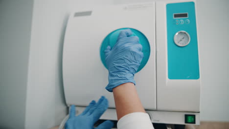 close-up of a dental autoclave being used by a dentist