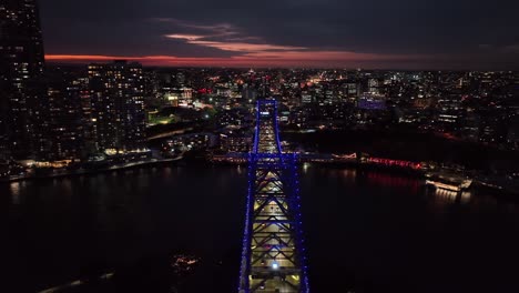 Establishing drone shot of Brisbane City&#039;s Story Bridge