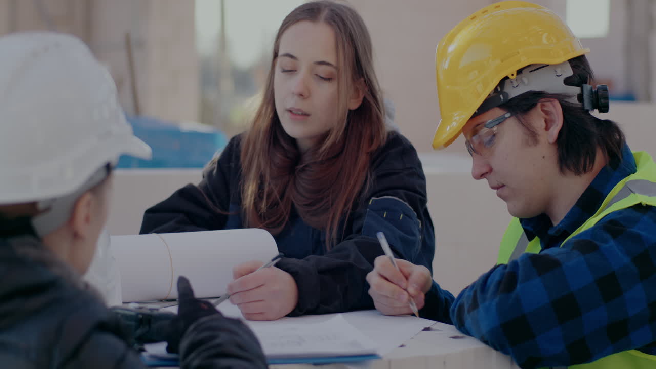 Construction Workers Planning on Site