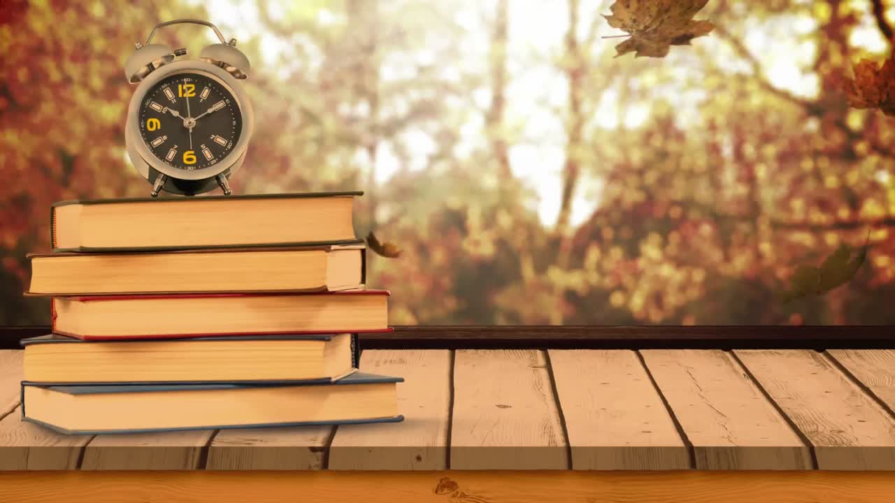 часы на куче книг и падающих осенних листьев 4k