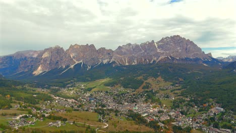 cortina d’ampezzo’s snowy landscape unfolds in a magical drone view.