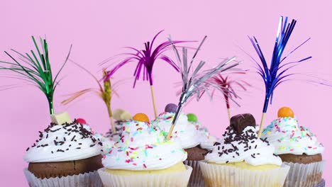 cup cakes decorated for the party on pink theme