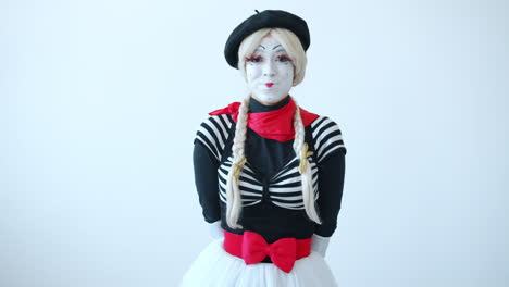 mime artist in traditional costume