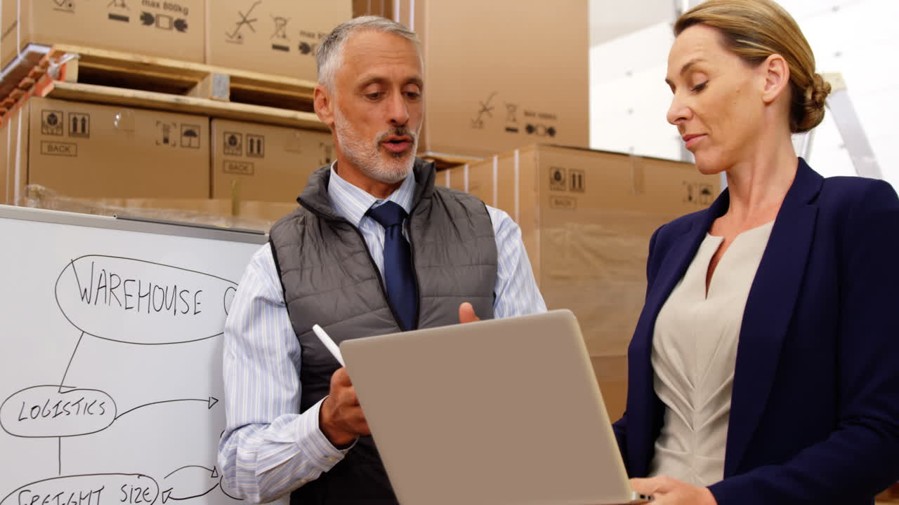 Manager using a digital tablet