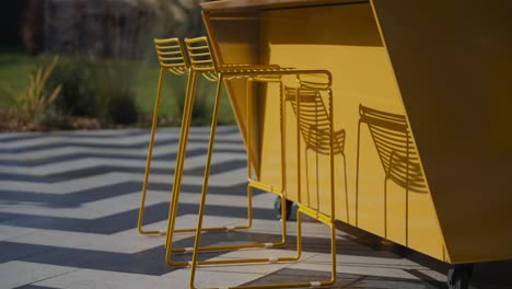 Outdoor-chairs-under-table-outdoors