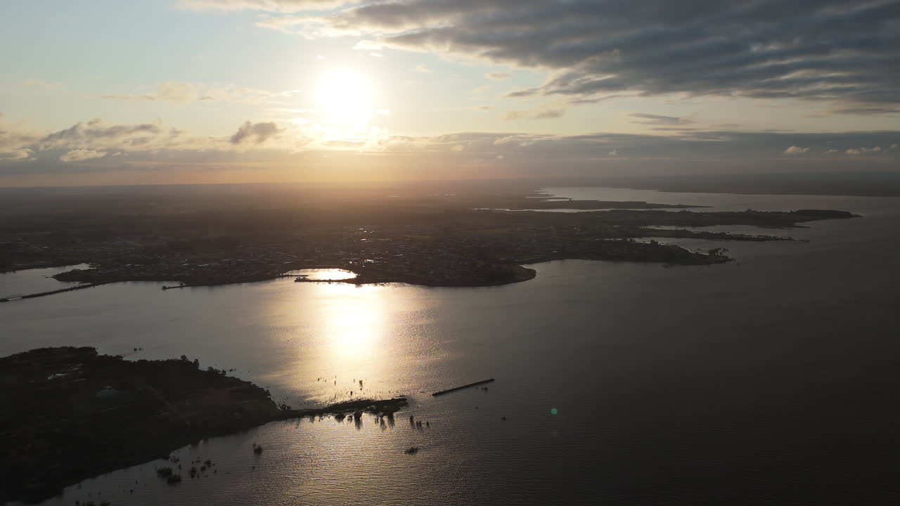 Aerial View of a Town on a Lake at Sunset
