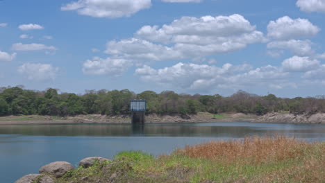 slow motion panning shot of lake alajuela affecting the panama canal drought