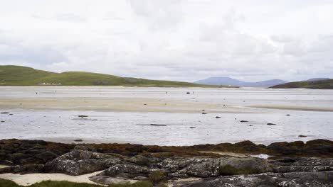 Shot-of-airport-staff-clearing-the-runway-of-debris-at-Barra-airport