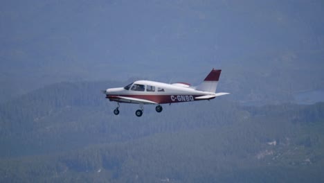 student pilot flying in single engine piston airplane, air to air view