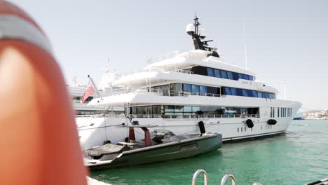 side view of a luxurious yacht in the port of ibiza, spain.
