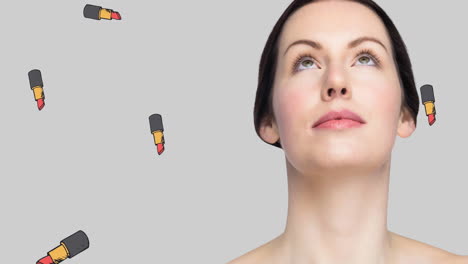 animación de iconos de lápiz labial y modelo sobre fondo verde