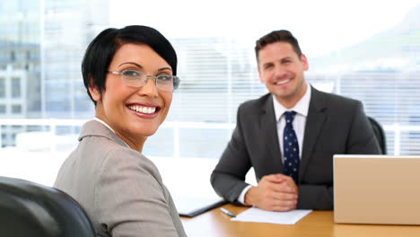 Handsome-businessman-shaking-hands-with-interviewee