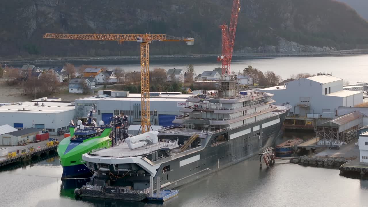 Close-up drone shot showing the VARD shipyards in S&oslash;vik which are currently working on rebuilding the research vessel "REV Ocean"
