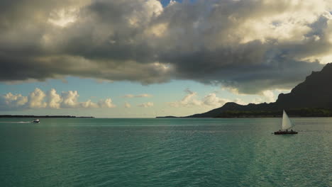 a sailboat striding off in the distance