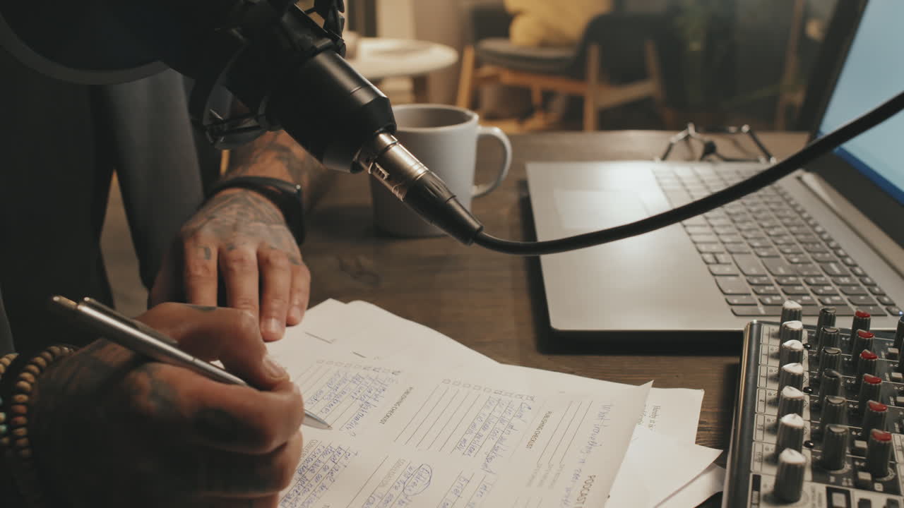 Hands of Podcast Host Editing Script